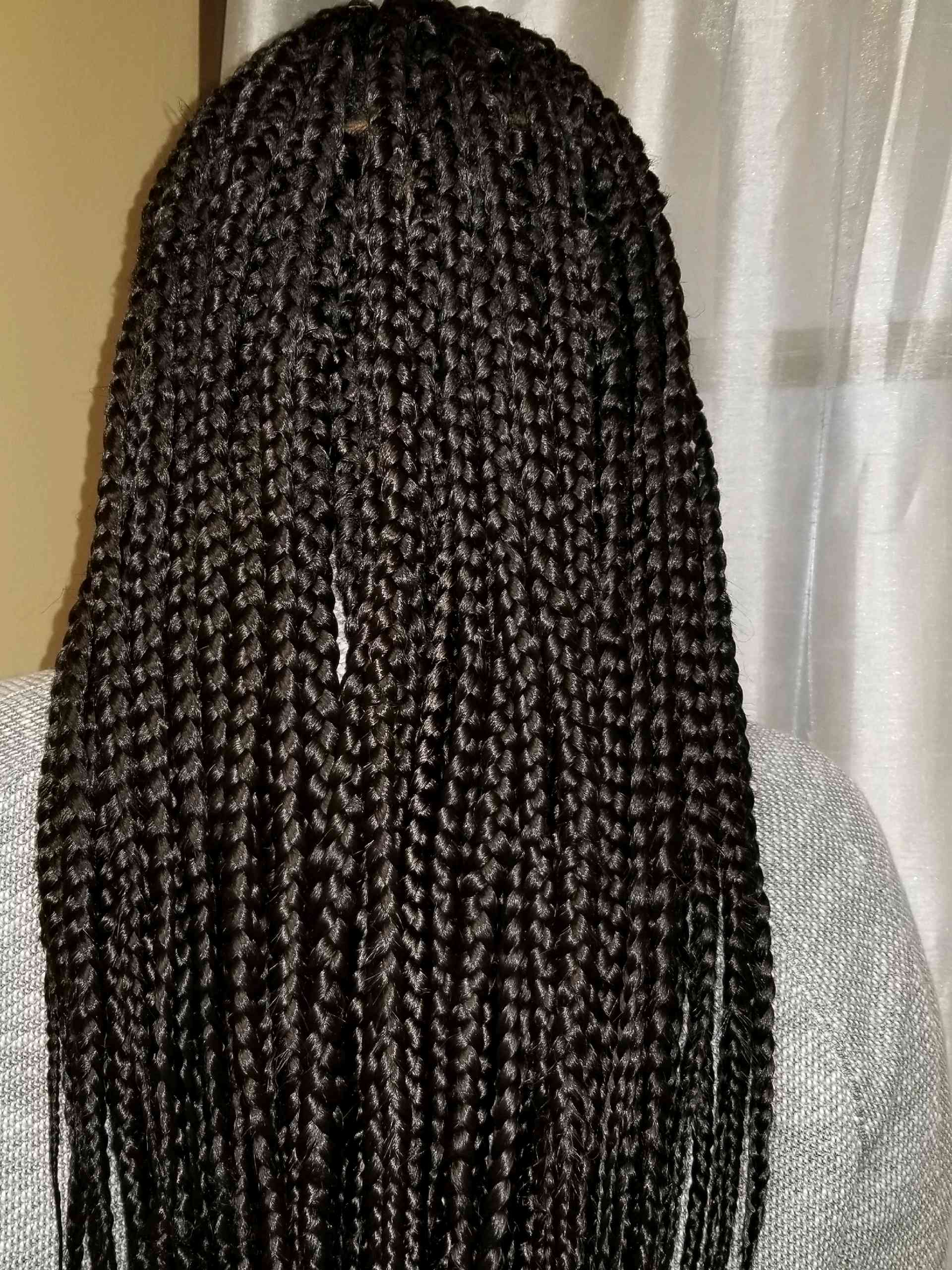 Braided hairstyle by Angel Hair Braids