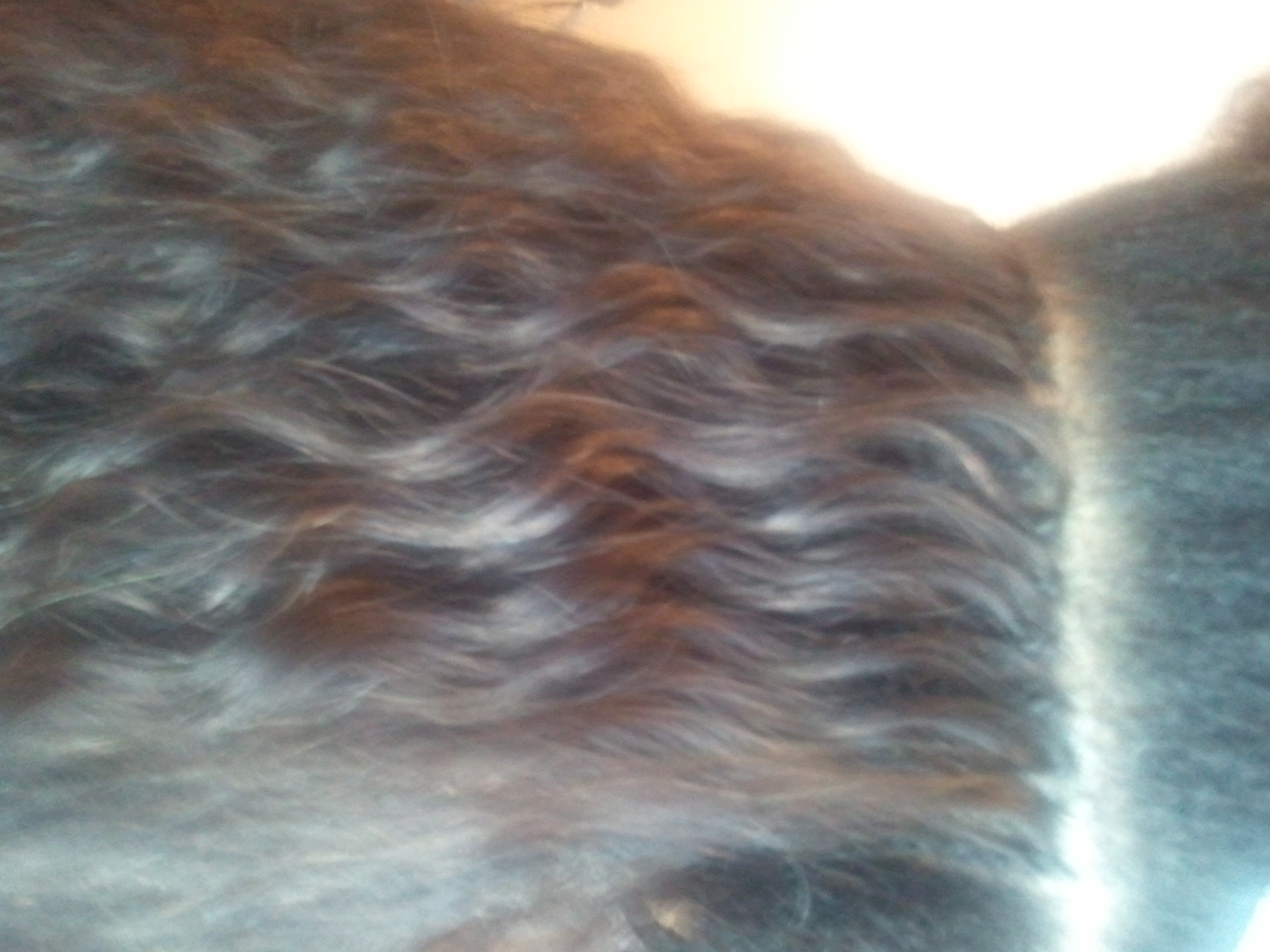 Beautiful braided hairstyle by Angel Hair Braids